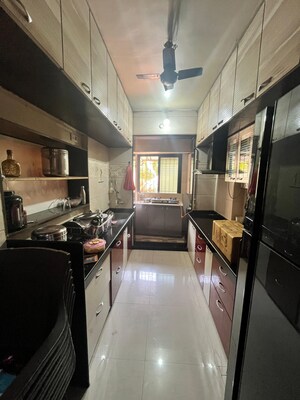 Kitchen in 2 BHK Apartment at Raunak Unnathi Gardens, Pokhran Road No One – for Sale
