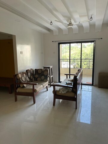 Living Room in 3 BHK Apartment at Usha Swapna, Prabhat Road – for Rent
