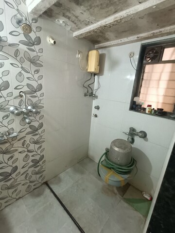 Bathroom in 2 BHK Apartment at Sai Baba Enclave, Goregaon West – for Rent