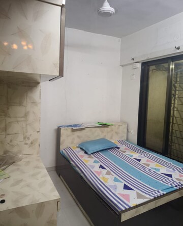 Bedroom in 2 BHK Apartment at Bhoomi Acres, Waghbil – for Rent