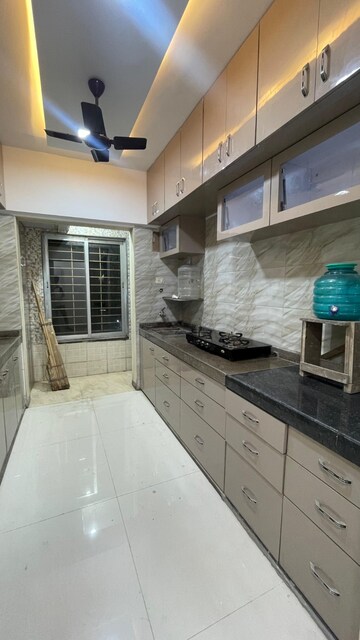 Kitchen in 2 BHK Apartment at Ravi Group Gaurav woods 2, Mira Road – for Rent