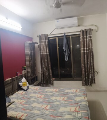 Bedroom in 2 BHK Apartment at Bhoomi Acres, Waghbil – for Rent