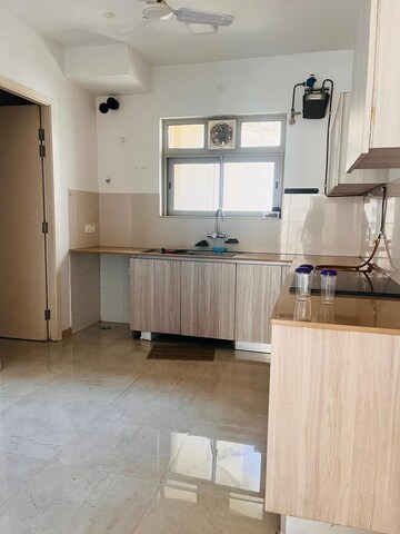 Kitchen in 3 BHK Apartment at Hiranandani Rodas Enclave Rosemount, Ghodbunder Road – for Rent