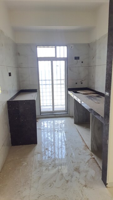 Kitchen in 2 BHK Apartment at Shree Nidhi Heights, Mira Road – for Rent