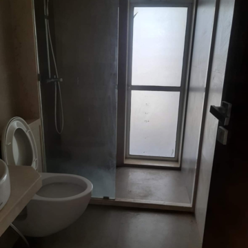 Bathroom in 2 BHK Apartment at Oshiwara – for Rent