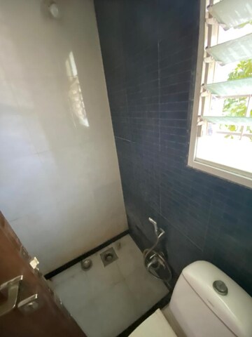 Bathroom in 1.5 BHK Apartment at Madhuraj Nagar Society, Kothrud – for Rent