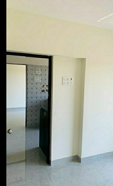 Living Room in 1 BHK Apartment at Delight Green View Apartment, Nalasopara West – for Sale