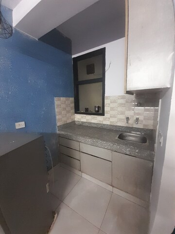 Kitchen in Studio Apartment at Dlf City Phase 3 – for Rent