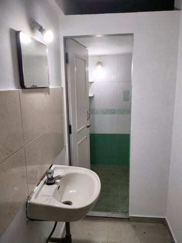 Bathroom in 1 BHK Apartment at Vijay Garden, Ghodbunder Road – for Rent