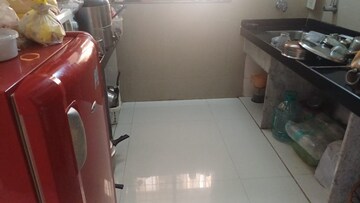 Kitchen in 2 BHK Apartment at Pushpak CHS Vasant Vihar, Vasant Vihar – for Sale