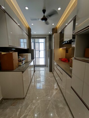 Kitchen in 3.5 BHK Apartment at Triveni Apartments CGHS, Paschim Vihar – for Rent