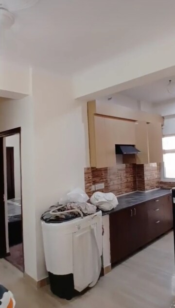 Kitchen in 2 BHK Apartment at Amrapali Terrace Homes, Tech Zone 4 Greater Noida – for Rent