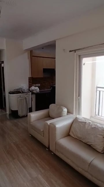 Living Room in 2 BHK Apartment at Amrapali Terrace Homes, Tech Zone 4 Greater Noida – for Rent