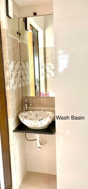 Bathroom in 2 BHK Apartment at Tharwani Meghna Montana, Ambernath West – for Rent