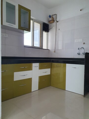 Kitchen in 2 BHK Apartment at Lifestyle Royal Oak, Wakad – for Rent