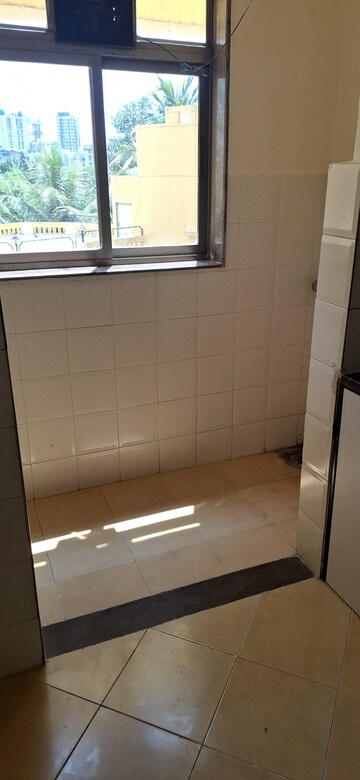 Bathroom in 2 BHK Apartment at Bredco Viceroy Court, Kandivali East – for Rent