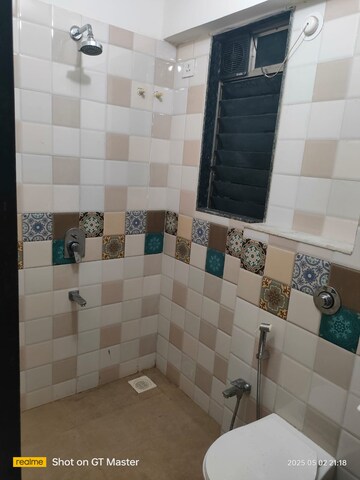 Bathroom in 2 BHK Apartment at Bindra Legacy, Andheri East – for Rent