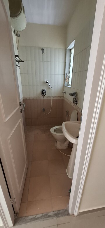 Bathroom in 2 BHK Apartment at Bredco Viceroy Court, Kandivali East – for Rent