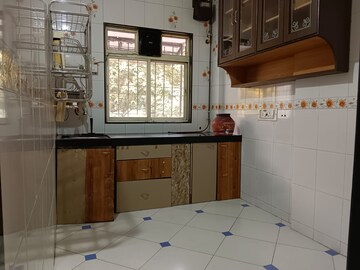 Kitchen in 2 BHK Apartment at Arihant Darshan CHS, Kandivali East – for Rent