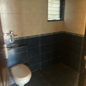 Bathroom in 2 BHK Apartment at Nyati Environ, Adarsh Colony – for Sale