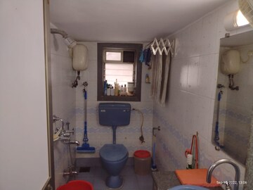 Bathroom in 2 BHK Apartment at Juhu Tarang, Andheri West – for Rent