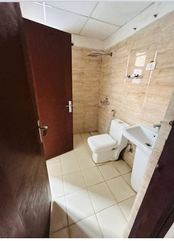 Bathroom in 3 BHK Apartment at Ajnara Le Garden, Sector 16b Greater Noida – for Rent