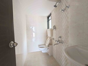 Bathroom in 2 BHK Apartment at Bhoomi Acropolis, Virar West – for Sale