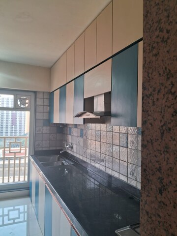 Kitchen in 4 BHK Apartment at Paradise Lifespaces Sai World City, New Panvel – for Rent