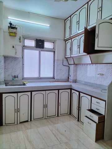 Kitchen in 1 BHK Apartment at Riddhi Gardens CHS, Malad East – for Rent