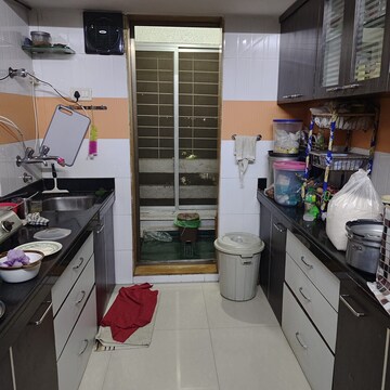 Kitchen in 2 BHK Apartment at Sandstone CHS Ltd, Mira Road – for Sale