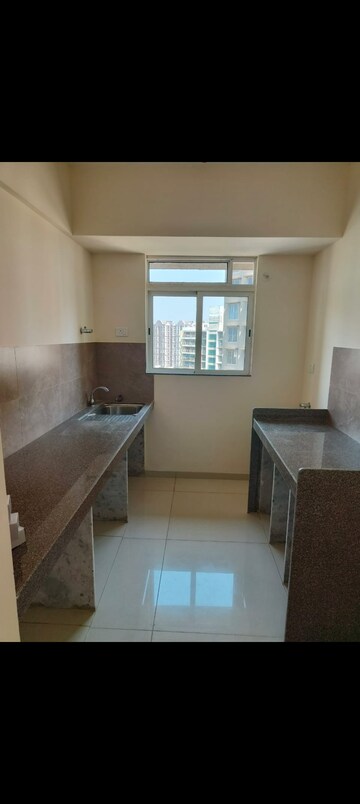 Kitchen in 1 BHK Apartment at Godrej Nest Kandivali, Kandivali East – for Rent