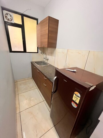 Kitchen in 1 RK Builder Floor at Ansal Sushant Lok I, Sector 43 – for Rent