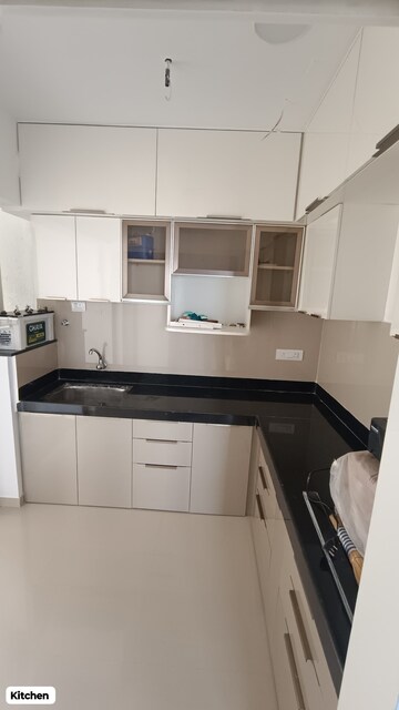 Kitchen in 2.5 BHK Apartment at Godrej Greens, Undri – for Sale