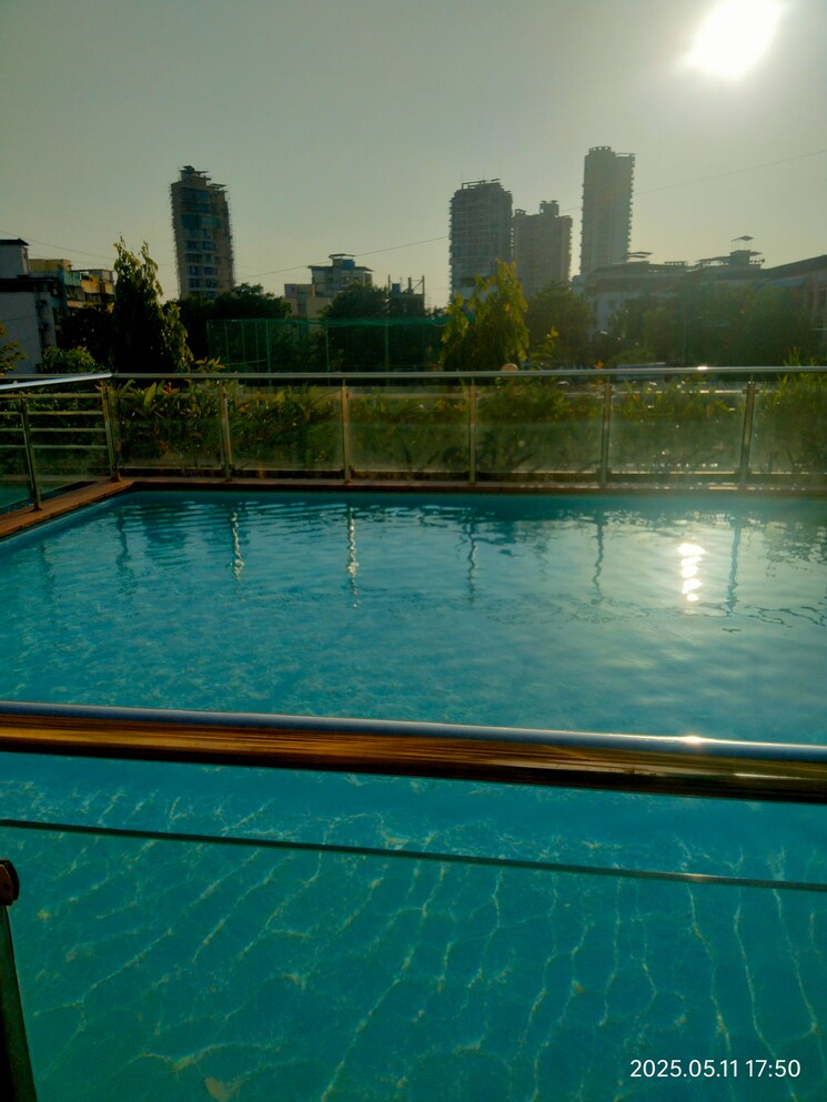 Swimming Pool, akshar-green-world 2 Bedroom 1010 Sq.Ft. Apartment In Dighe Navi Mumbai 8653920