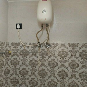 Bathroom in 2 BHK Apartment at Arpan Darpan CHS, Goregaon East – for Sale