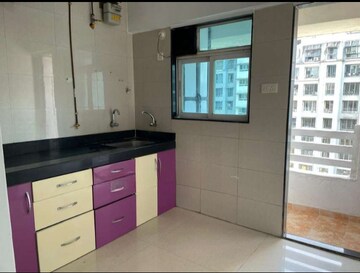 Kitchen in 1 BHK Apartment at Cosmos 27 Gbr, Kasarvadavali – for Sale