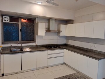 Kitchen in 4 BHK Apartment at Tata Primanti-Tower Residences, Sector 72 – for Sale
