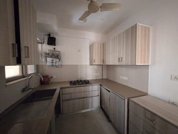 Kitchen in 2.5 BHK Apartment at Rodas Enclave Woodstock, Patlipada – for Rent