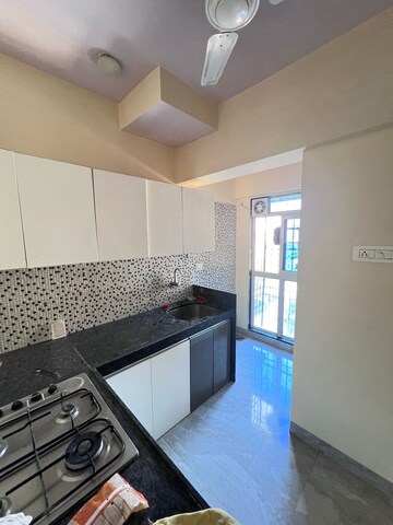 Kitchen in 2 BHK Apartment at Palash Towers, Andheri West – for Rent