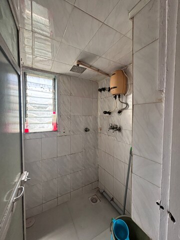 Bathroom in 2 BHK Apartment at Palash Towers, Andheri West – for Rent