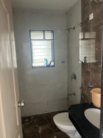 Bathroom in 3 BHK Apartment at Shreeyash Shree Woods, Dhanori – for Rent