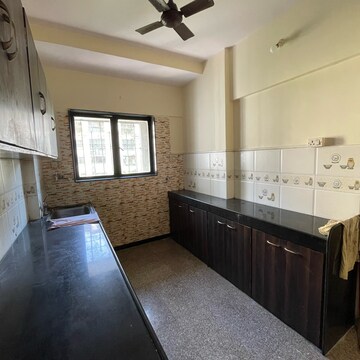 Kitchen in 2 BHK Apartment at Valentine Apartments, Shiv Darshan Nagar – for Rent
