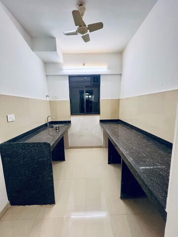 Kitchen in 1 BHK Apartment at Lodha Palava Downtown, Dombivli East – for Rent