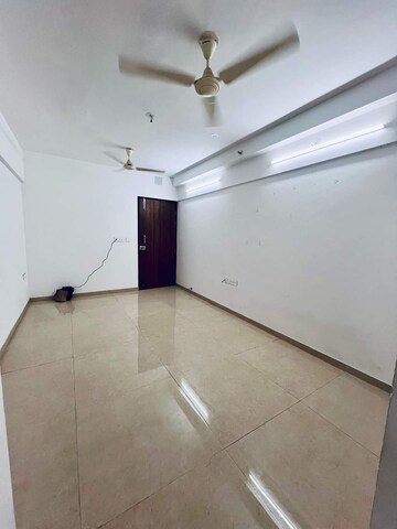 Living Room in 1 BHK Apartment at Lodha Palava Downtown, Dombivli East – for Rent
