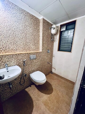 Bathroom in 1 BHK Apartment at Lodha Palava Downtown, Dombivli East – for Rent
