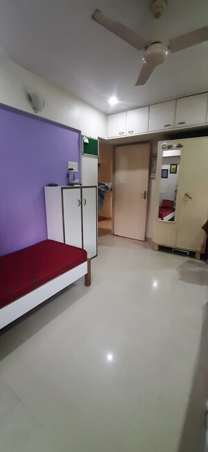 Master Bedroom in 1 BHK Apartment at Ajit Park CHS, Malad West – for Sale