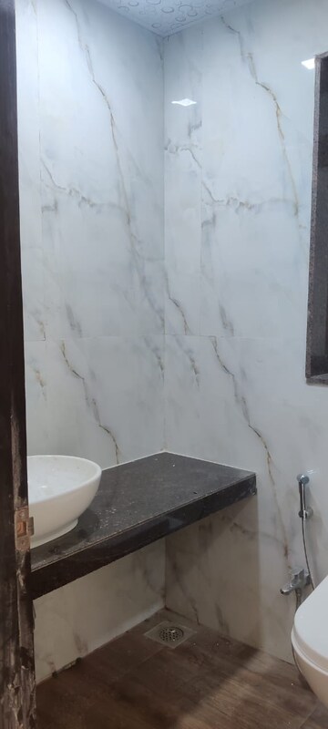 Bathroom in 3 BHK Apartment at Jyoti Sukriti, Goregaon East – for Rent