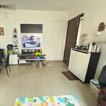 Living Room in 2 BHK Apartment at Rustomjee Athena, Vrindavan Society – for Rent