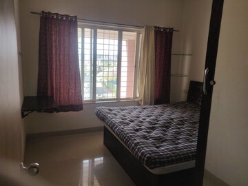 Bedroom in 2 BHK Apartment at Kumar Piccadilly, Wakad – for Rent