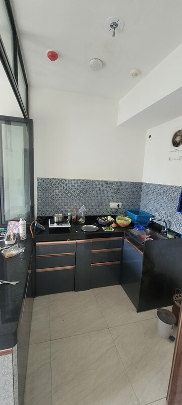 Kitchen in 2 BHK Apartment at Lodha Crown Quality Homes, Majiwada – for Rent
